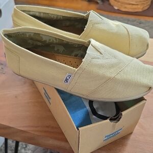TOMS Light Yellow Canvas Slip-Ons